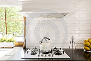 White brick backsplash idea