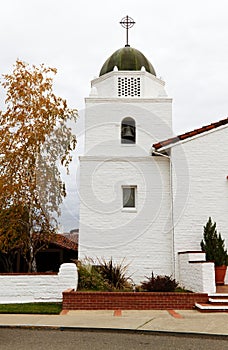 White Brick Bell Tower For Christian Church With Cupula photo