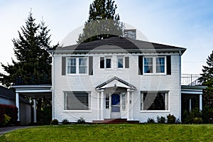 White brick two-story family house