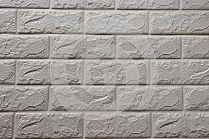White brick wall background, uneven