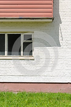 A white brick wall facade