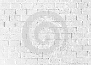 White brick wall. Grunge old brick room textured background for wallpaper and graphic web design. Surface of gray brick