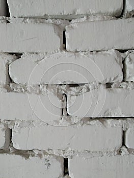 White brick wall  in the old basement