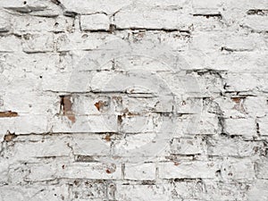 White brick wall. Old crumbling wall.White brick