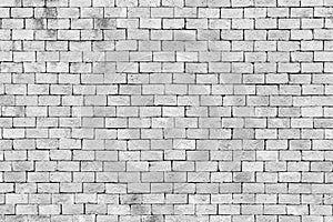 White brick wall texture background. Brickwork or stonework flooring interior rock old pattern clean concrete grid uneven bricks d