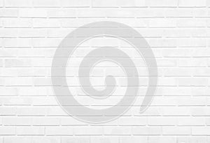 White brick wall texture background in room at subway. Brickwork stonework interior, rock old concrete grid uneven abstract