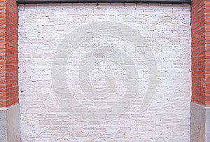 White brick wall texture and red pole on background , copy space