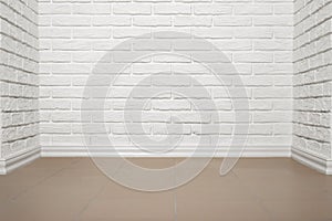White brick wall with tiled floor, abstract background photo