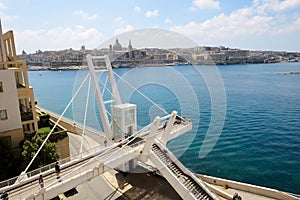The white bridge in Sliema and view on Valleta photo