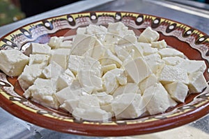 White brine cheese from cow, goat or sheep milk ready for eating . White brine bulgarian sirene ready for consummation. Traditiona