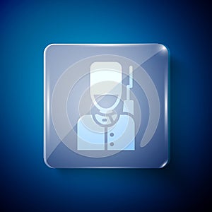 White British guardsman with bearskin hat marching icon isolated on blue background. Square glass panels. Vector