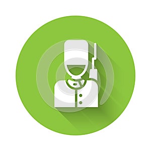 White British guardsman with bearskin hat marching icon isolated with long shadow. Green circle button. Vector