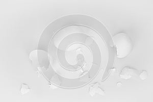 White, broken eggs, shells, white background