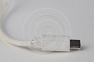 White broken micro USB cable on a white background