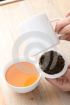 White broken tea with tea soup