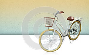 white and brown bicycle on white floor background, yellow and green cement wall, object, transpot, decor, fashion, banner, copy