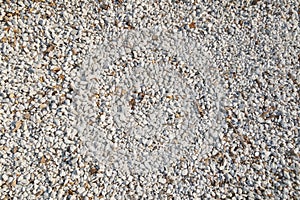 White and Brown pebble stone texture for background. The texture of brown gravel stones