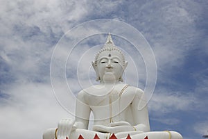 White Buddha statue located in the temple