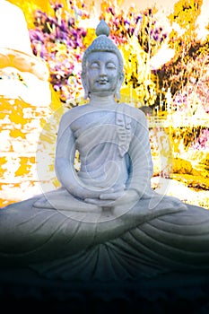 White Buddha statue in a meditation center at Lampang Province