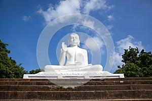 White Buddha statue. Mihintale, Sri Lanka