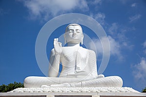 White Buddha statue. Mihintale, Sri Lanka