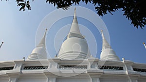 White Buddhism Pagodas With Blue Sky