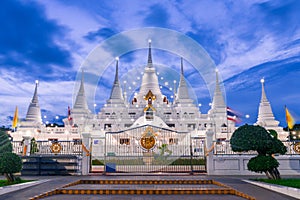 White Buddhist Pagoda with multiple spires at Wat Asokaram Temple in Samutprakan province, Thailand