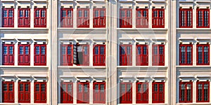 White building and red windows in classic colonial architecture buildings in singapore china town