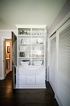 White built in decorative shelves