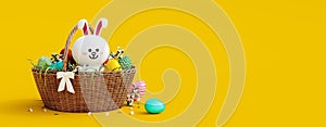 White bunny with wooden basket full of colorful eggs on yellow Easter background