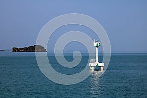 White buoy Navigation or lateral Marks floating in the sea