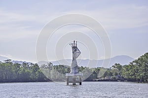 White buoy Navigation or lateral Marks floating in the sea at Thailand
