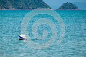 White Buoyancy Ball Floating in the Sea photo