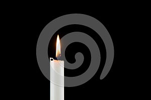 A white burning candle