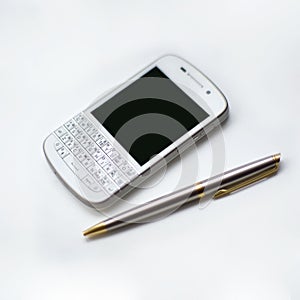 White business smartphone and pen