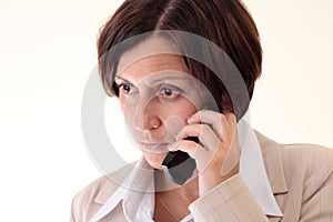 White businesswoman with handy, unhappy