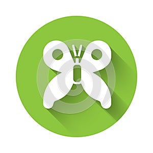 White Butterfly icon isolated with long shadow. Green circle button. Vector