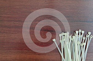 White cable tiles on wooden background