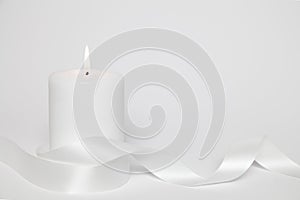 White candle and loop