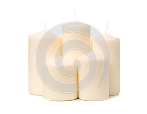 White candle on white background isolated. Set of wax candle