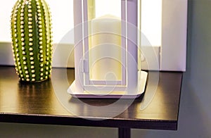 White candle on white background