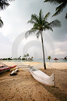 White canoe on tropical beach