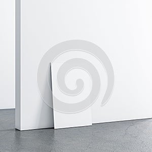 White Canvas Poster Mockup standing on concrete floor in white empty room