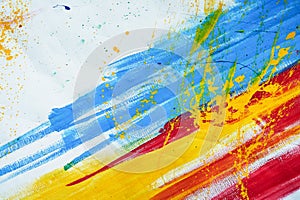 White canvas with red blue and yellow brush strokes.Texture or background