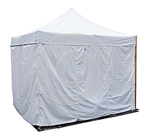 White canvas tent for small shop  installed on the street isolated