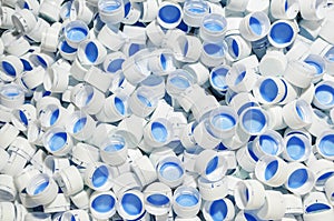 White caps of plastic bottles