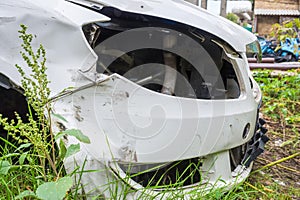White car after an accident. Car crash, insurance. Closeup