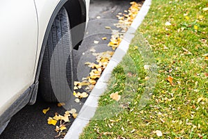 White car and autumn, road