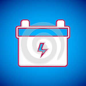 White Car battery icon isolated on blue background. Accumulator battery energy power and electricity accumulator battery