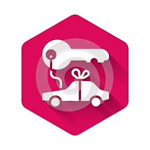 White Car gift icon isolated with long shadow background. Car key prize. Pink hexagon button. Vector